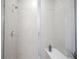 Modern shower design featuring stone-look tile and a glass enclosure at 714 Faudree Dr, Westfield, IN 46074