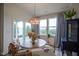 Bright dining area with large windows and sliding door at 714 Faudree Dr, Westfield, IN 46074