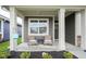 Inviting covered porch with seating area, perfect for enjoying the outdoors at 714 Faudree Dr, Westfield, IN 46074
