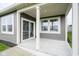 A covered patio provides views to backyard at 714 Faudree Dr, Westfield, IN 46074