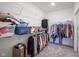 Bright walk-in closet with carpet flooring, wire shelving, and ample storage space for clothing and accessories at 714 Faudree Dr, Westfield, IN 46074