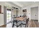 Cozy dining area features modern finishes and sliding glass doors to the backyard at 725 Meadowbrook Ln, Franklin, IN 46131