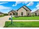 Charming single-Gathering home with a well-kept lawn and landscape and a classic mailbox on the curb at 725 Meadowbrook Ln, Franklin, IN 46131