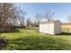 Well-maintained backyard features a storage shed and green space at 7260 Marla Dr, Indianapolis, IN 46256