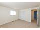 Bedroom with closet doors, plush carpet, and a door leading to another room at 7260 Marla Dr, Indianapolis, IN 46256