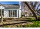 Inviting backyard patio with a seating area and mature trees, ideal for outdoor enjoyment at 8037 Lynch Ln, Indianapolis, IN 46250