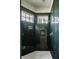 Marble-walled shower featuring a window and modern fixtures, offering a spa-like experience at 8037 Lynch Ln, Indianapolis, IN 46250