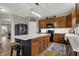 Modern kitchen with stainless steel appliances, stylish countertops, and wooden cabinets at 8734 Blue Marlin Dr, Indianapolis, IN 46239