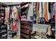 Spacious walk-in closet with custom shelving, hanging racks, and ample storage space at 8734 Blue Marlin Dr, Indianapolis, IN 46239