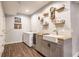 Functional bar area with ample counter space, a deep freezer and a convenient sink at 8855 Sugar Cay Ct, Zionsville, IN 46077