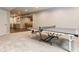 Basement featuring a ping pong table, bar, and seating area at 8855 Sugar Cay Ct, Zionsville, IN 46077