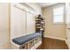 Inviting mudroom with custom bench seating, cubbies, and shoe storage, adding functionality and style at 8855 Sugar Cay Ct, Zionsville, IN 46077