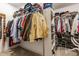 Spacious walk-in closet with custom shelving and ample storage for clothes and accessories at 8855 Sugar Cay Ct, Zionsville, IN 46077