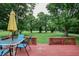 A backyard patio with a view to the trees at 1000 Janet Dr, Greenwood, IN 46142
