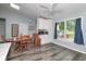 Bright dining area with wood floors, and backyard views at 1000 Janet Dr, Greenwood, IN 46142