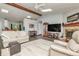 Spacious living room with fireplace, vaulted ceiling and skylight at 1000 Janet Dr, Greenwood, IN 46142