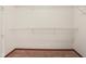 Walk in closet features neutral carpet, base trim and a wire shelf at 1012 S Montgomery Rd, Greenwood, IN 46143