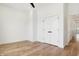 Bedroom with a closet, hardwood floors and white paint at 1018 Calvary St, Indianapolis, IN 46203