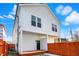 Exterior view of a two-story home with white siding and a covered back porch at 1018 Calvary St, Indianapolis, IN 46203
