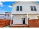 Two-story home with white siding and a covered back porch at 1018 Calvary St, Indianapolis, IN 46203