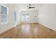 Spacious living room with hardwood floors and ample natural light, offering a blank canvas for personal style at 1018 Calvary St, Indianapolis, IN 46203
