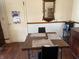 Eat-in kitchen features a dark table with chairs at 1018 E 106Th St, Indianapolis, IN 46280