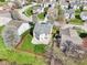 An aerial image of a backyard with lush green lawn, complemented by a wood privacy fence at 10303 Memorial Knoll Dr, Indianapolis, IN 46234
