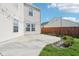 Outdoor concrete patio and lawn, accented with exterior string lights at 10303 Memorial Knoll Dr, Indianapolis, IN 46234