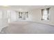 Bright bedroom featuring neutral walls, carpeting, and natural light from windows at 10303 Memorial Knoll Dr, Indianapolis, IN 46234