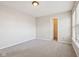 Clean bedroom with natural lighting, neutral paint, and carpet flooring at 10303 Memorial Knoll Dr, Indianapolis, IN 46234