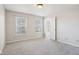 Bright bedroom featuring large windows and neutral walls at 10303 Memorial Knoll Dr, Indianapolis, IN 46234