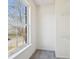 View of a walk-in closet with built-in shelving and a window at 10303 Memorial Knoll Dr, Indianapolis, IN 46234