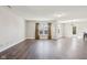 Bright and airy living room with wood floors and access to the outdoor patio at 10303 Memorial Knoll Dr, Indianapolis, IN 46234