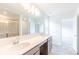 Modern bathroom featuring double sink vanity, with walk in shower and ample lighting at 1038 Stubble Run, Danville, IN 46122