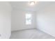 Bright bedroom with neutral carpet and a window view at 1038 Stubble Run, Danville, IN 46122