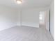 Neutral bedroom with open door and soft carpet at 1038 Stubble Run, Danville, IN 46122