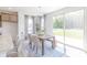 Dining area features sliding glass doors leading to the backyard, letting in lots of natural light at 1038 Stubble Run, Danville, IN 46122