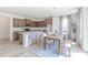 Open concept, eat-in kitchen with adjacent dining area and large windows with lots of natural light at 1038 Stubble Run, Danville, IN 46122