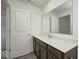 Bathroom with a white vanity countertop and open door at 1056 Stubble Run, Danville, IN 46122
