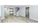 Spacious living room with hardwood floors, showcasing seamless transitions to adjacent rooms at 121 Illinois St, Shirley, IN 47384