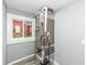 Utility room featuring light gray paint and the HVAC system positioned in the corner near a window at 121 Illinois St, Shirley, IN 47384