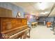 Finished basement featuring a piano and recreation area at 12166 N Bray Rd, Mooresville, IN 46158
