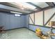 Partially finished basement space with decorative beams and natural light at 12166 N Bray Rd, Mooresville, IN 46158