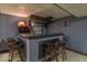 Basement bar area with custom lighting and seating at 12166 N Bray Rd, Mooresville, IN 46158