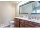 Bathroom featuring a double sink vanity and large mirror at 12166 N Bray Rd, Mooresville, IN 46158