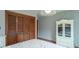 Well-lit bedroom featuring closet space, natural light, and modern decor at 12166 N Bray Rd, Mooresville, IN 46158