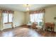 Comfortable living room featuring natural light, hardwood floors, and classic decor at 12166 N Bray Rd, Mooresville, IN 46158