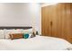 Cozy bedroom featuring a comfortable bed, sleek modern wardrobe, and soft lighting for a relaxing ambiance at 123 W 81St St, Indianapolis, IN 46260