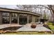 Charming outdoor patio with a cozy fire pit area, great for entertaining and enjoying the outdoors at 123 W 81St St, Indianapolis, IN 46260