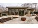 Stylish patio area with a fire pit and comfortable seating, perfect for gatherings at 123 W 81St St, Indianapolis, IN 46260